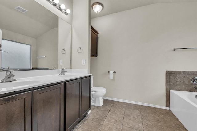 6525 Burling St, Woodway, TX 76712 - full bathroom featuring lofted ceiling, double vanity, a garden tub, and tile patterned flooring