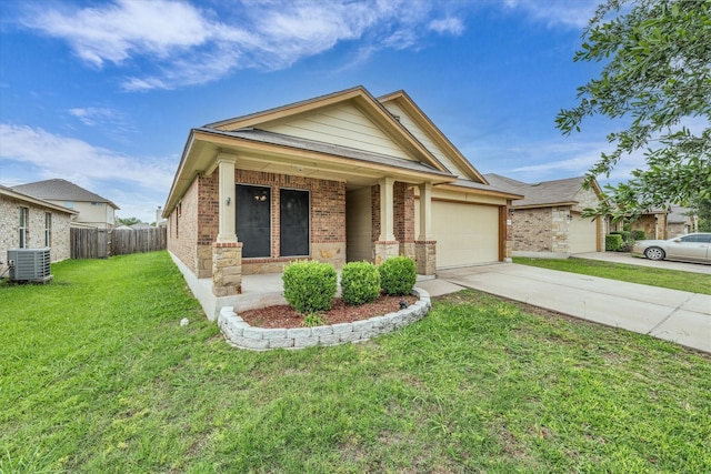 6525 Burling St, Woodway, TX 76712 - view of front facade featuring brick siding, concrete driveway, an attached garage, and a porch