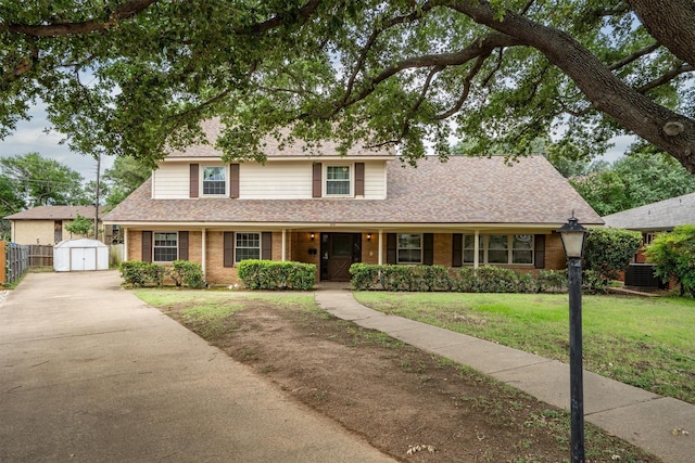 200 Hillcrest Ct, Irving, TX 75062 - traditional-style home featuring a storage shed, brick siding, concrete driveway, and a shingled roof