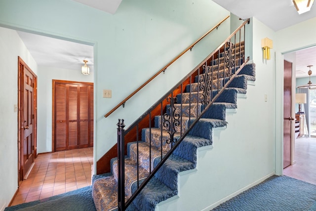 200 Hillcrest Ct, Irving, TX 75062 - staircase with baseboards and carpet floors
