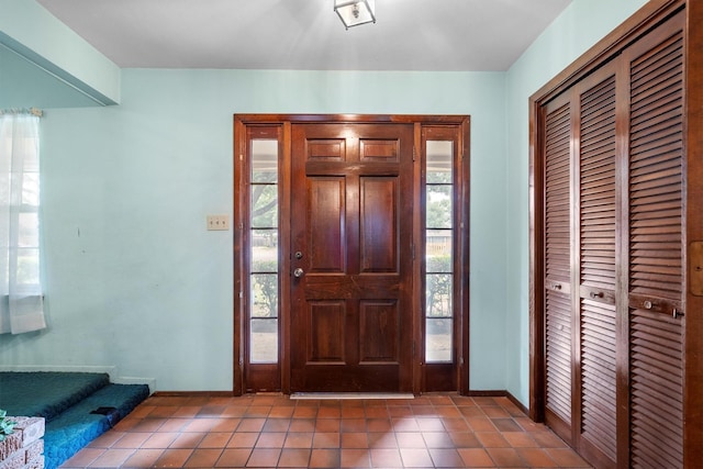 200 Hillcrest Ct, Irving, TX 75062 - tiled entryway featuring baseboards