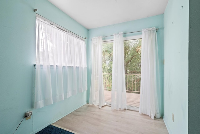200 Hillcrest Ct, Irving, TX 75062 - empty room with wood finished floors and baseboards