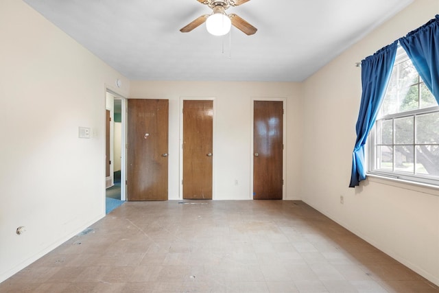 200 Hillcrest Ct, Irving, TX 75062 - unfurnished bedroom with baseboards and a ceiling fan
