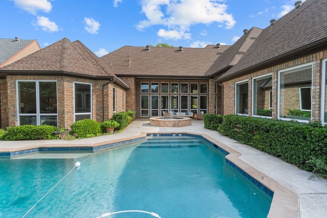 4609 Huffman Ct, Plano, TX 75093 - view of swimming pool with a pool with connected hot tub and a patio area
