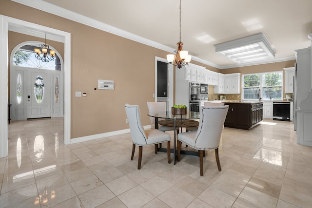 4609 Huffman Ct, Plano, TX 75093 - dining space featuring a chandelier and crown molding