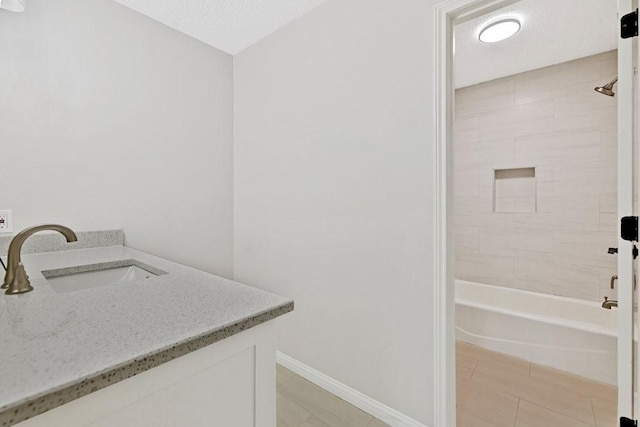 4103 Steeplewood Ct, Arlington, TX 76016 - washroom featuring a sink, baseboards, and a textured ceiling