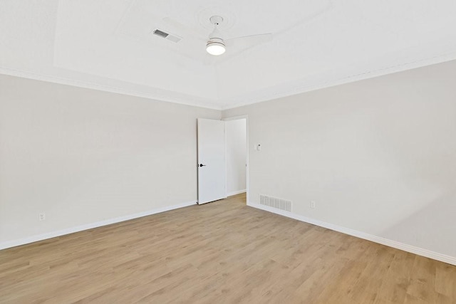 4103 Steeplewood Ct, Arlington, TX 76016 - empty room with light wood-type flooring, baseboards, a raised ceiling, crown molding, and ceiling fan