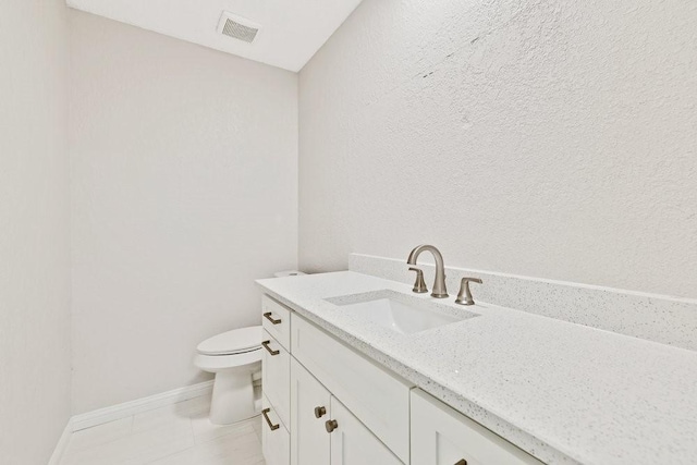 4103 Steeplewood Ct, Arlington, TX 76016 - half bath featuring toilet, vanity, baseboards, and tile patterned floors