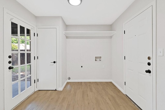 4103 Steeplewood Ct, Arlington, TX 76016 - laundry room featuring light wood-style flooring, washer hookup, plenty of natural light, and baseboards