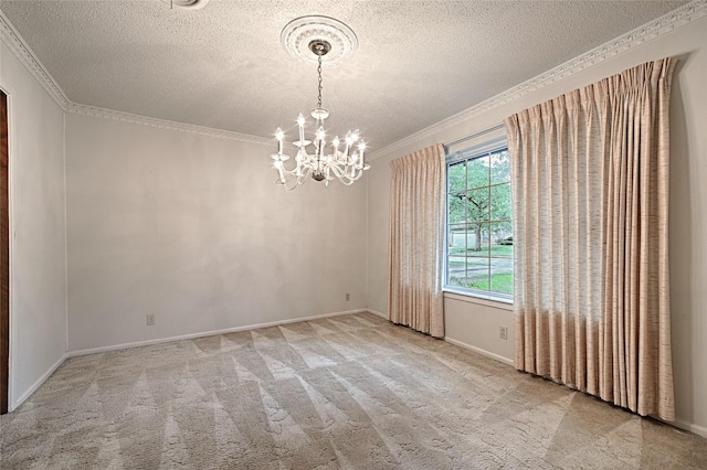 1013 Mountain Ter, Hurst, TX 76053 - carpeted spare room featuring a textured ceiling, crown molding, and a chandelier