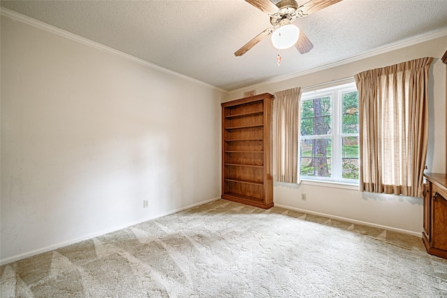 1013 Mountain Ter, Hurst, TX 76053 - empty room featuring a ceiling fan, light carpet, a textured ceiling, and crown molding