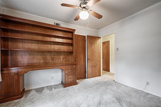 1013 Mountain Ter, Hurst, TX 76053 - unfurnished office with light colored carpet, ceiling fan, a textured ceiling, and ornamental molding