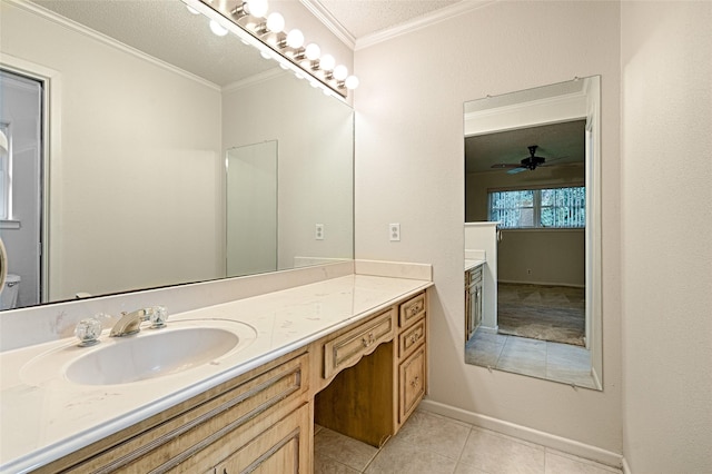 1013 Mountain Ter, Hurst, TX 76053 - bathroom with vanity, ceiling fan, tile patterned floors, and ornamental molding