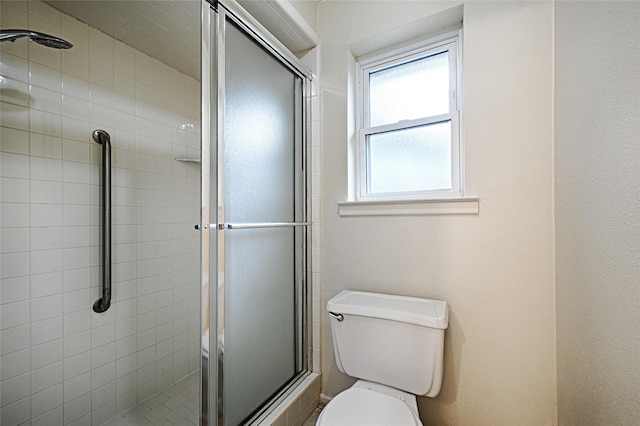1013 Mountain Ter, Hurst, TX 76053 - bathroom featuring toilet and a shower stall