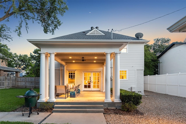 6303 Meadow Rd, Dallas, TX 75230 - back of property featuring french doors, a porch, roof with shingles, brick siding, and a ceiling fan