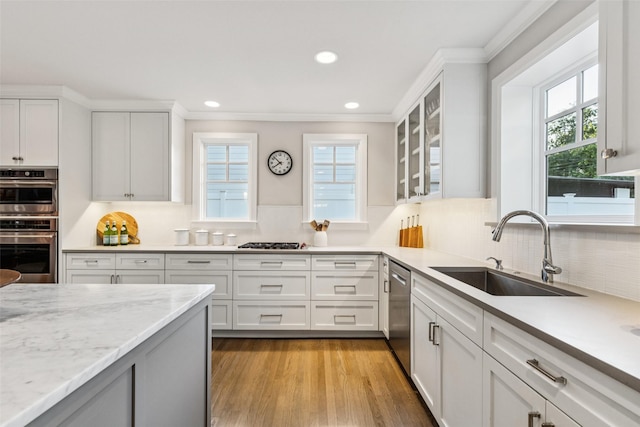 6303 Meadow Rd, Dallas, TX 75230 - kitchen with stainless steel appliances, ornamental molding, decorative backsplash, recessed lighting, and healthy amount of natural light