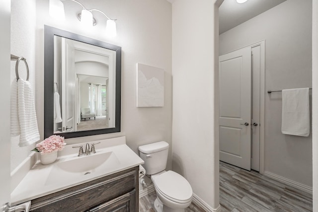 6340 Crossvine Trl, Flower Mound, TX 76226 - half bath with vanity and wood finished floors