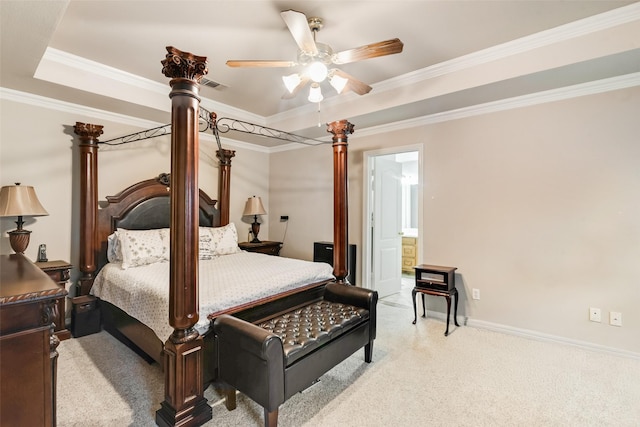 3001 Coventry Ln, Waxahachie, TX 75165 - bedroom featuring light carpet, ornamental molding, a ceiling fan, ensuite bath, and a tray ceiling