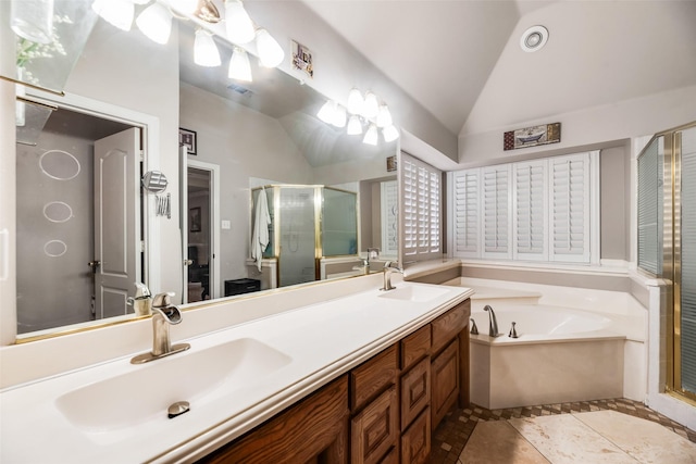 3001 Coventry Ln, Waxahachie, TX 75165 - bathroom featuring vaulted ceiling, a stall shower, a garden tub, and double vanity