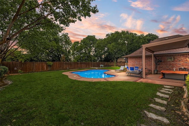 3001 Coventry Ln, Waxahachie, TX 75165 - pool at dusk with a patio area and a fenced backyard