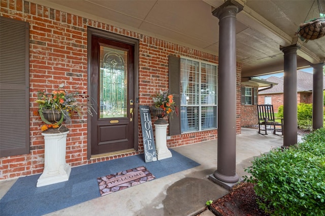3001 Coventry Ln, Waxahachie, TX 75165 - view of exterior entry with a porch and brick siding