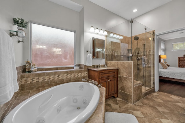 2413 London Dr, Plano, TX 75025 - ensuite bathroom with a shower stall, a tub with jets, and vanity