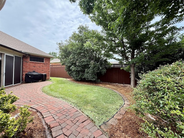 2413 London Dr, Plano, TX 75025 - fenced backyard with a patio area