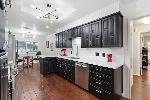 11721 Pine Creek Ct, Fort Worth, TX 76008 - kitchen featuring dishwasher, a chandelier, dark wood finished floors, dark cabinetry, and light countertops