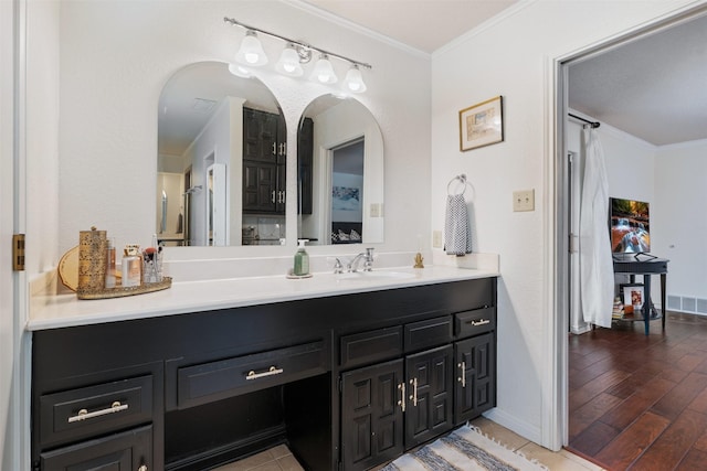 11721 Pine Creek Ct, Fort Worth, TX 76008 - bathroom featuring ornamental molding, vanity, and wood finished floors