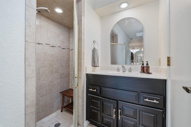 11721 Pine Creek Ct, Fort Worth, TX 76008 - full bath featuring a stall shower, vanity, a textured wall, and recessed lighting