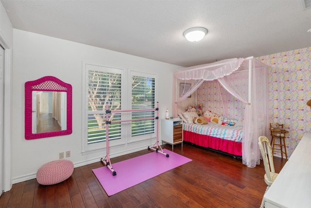 11721 Pine Creek Ct, Fort Worth, TX 76008 - bedroom with wood finished floors and wallpapered walls