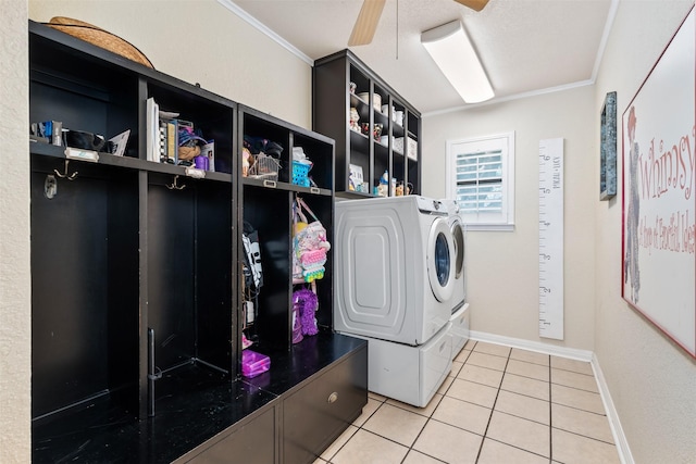 11721 Pine Creek Ct, Fort Worth, TX 76008 - laundry area featuring washer and clothes dryer, a ceiling fan, light tile patterned flooring, and ornamental molding