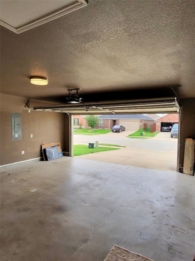 3116 Montserrat Creek Dr, Little Elm, TX 75068 - garage with electric panel and a garage door opener