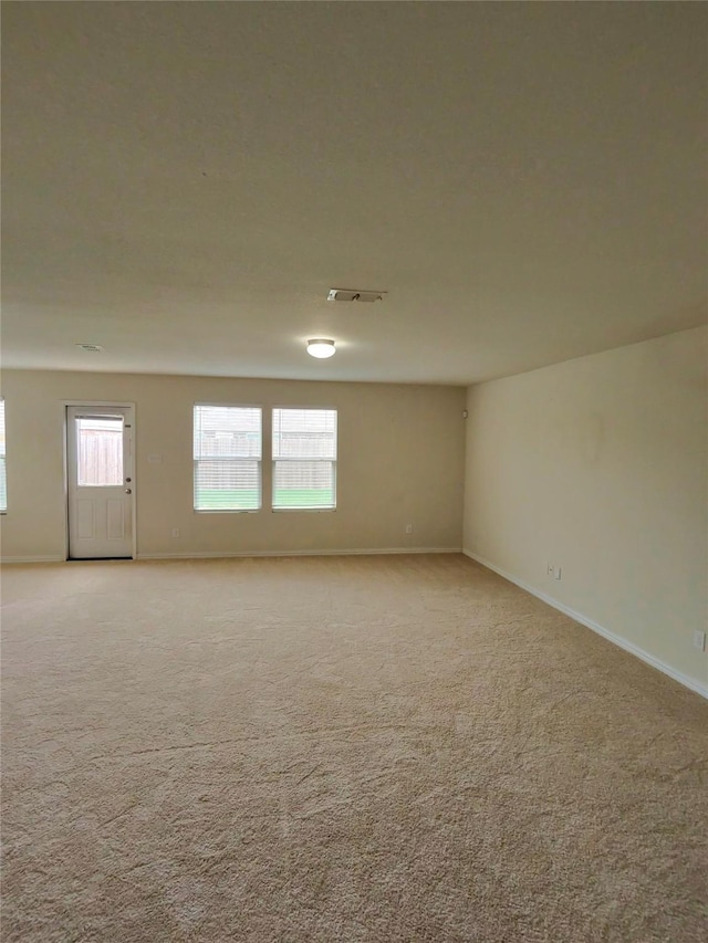 3116 Montserrat Creek Dr, Little Elm, TX 75068 - empty room with baseboards and light colored carpet