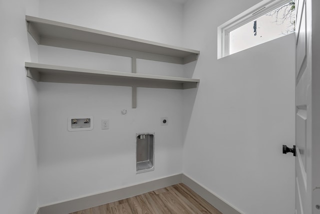 3709 Colonial Ave, Dallas, TX 75215 - laundry room with light wood-type flooring, hookup for a washing machine, hookup for an electric dryer, and hookup for a gas dryer