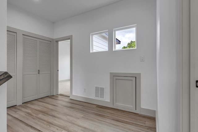 3709 Colonial Ave, Dallas, TX 75215 - unfurnished bedroom featuring light wood finished floors