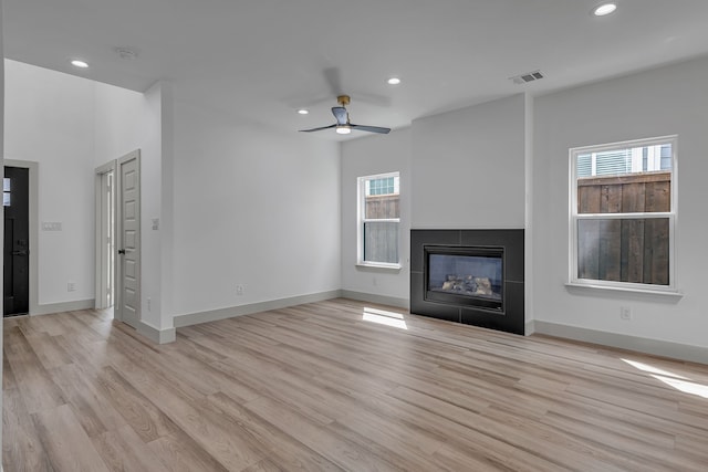 3709 Colonial Ave, Dallas, TX 75215 - unfurnished living room with recessed lighting, light wood finished floors, a ceiling fan, and healthy amount of natural light