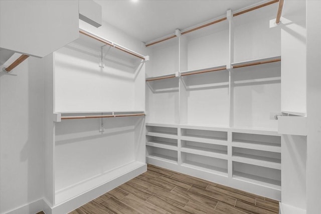 5822 Diaz Ave, Fort Worth, TX 76107 - walk in closet with wood finished floors