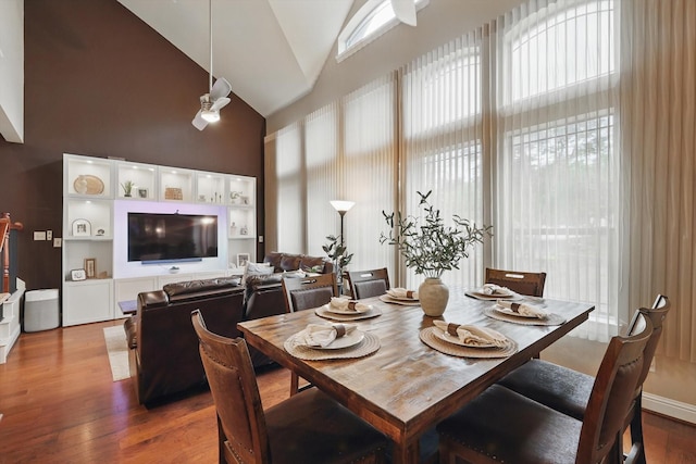 934 Brook Forest Ln, Euless, TX 76039 - dining space featuring high vaulted ceiling and dark wood finished floors