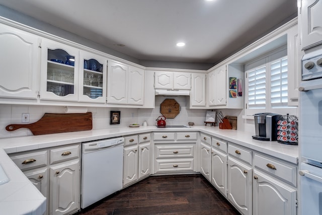 2313 Parkhaven Dr, Plano, TX 75075 - kitchen featuring dishwasher, under cabinet range hood, oven, white cabinets, and recessed lighting