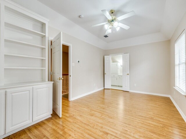564 Austin Ct, Coppell, TX 75019 - laundry area featuring electric dryer hookup, marble look tiles, and cabinet space