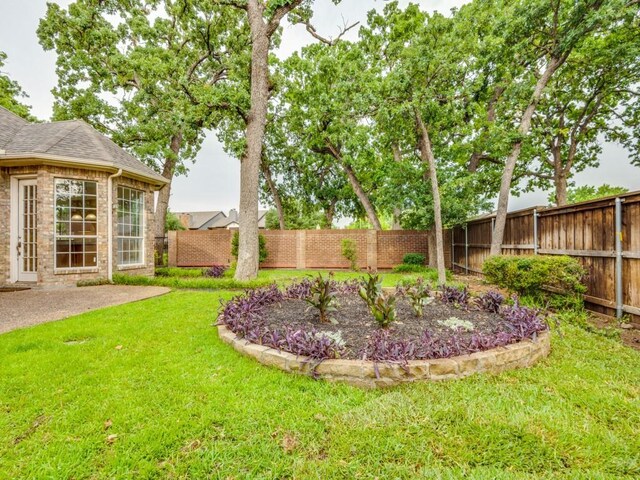 564 Austin Ct, Coppell, TX 75019 - bathroom with a stall shower, vanity, lofted ceiling, and tile patterned flooring