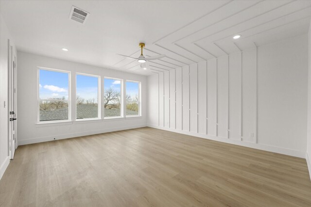 3434 Puget St, Dallas, TX 75212 - spare room featuring light wood-style floors, recessed lighting, and a ceiling fan