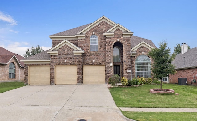 5312 Ridgeson Dr, Mckinney, TX 75071 - view of front of house featuring concrete driveway, brick siding, a front lawn, and roof with shingles