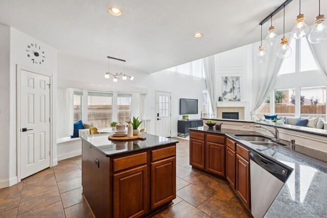 5312 Ridgeson Dr, Mckinney, TX 75071 - kitchen featuring open floor plan, stainless steel dishwasher, a fireplace, and recessed lighting