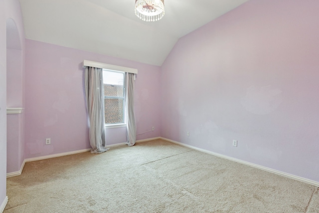 5312 Ridgeson Dr, Mckinney, TX 75071 - carpeted empty room with lofted ceiling and baseboards