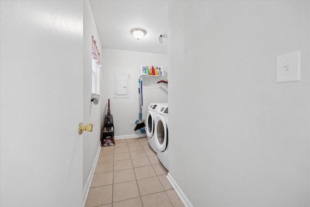 707 Marco Dr, Runaway Bay, TX 76426 - laundry area featuring separate washer and dryer, light tile patterned floors, and electric panel