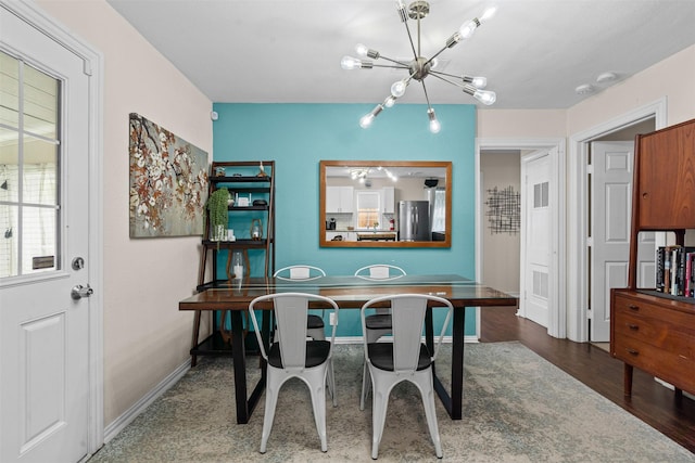 4204 Geddes Ave, Fort Worth, TX 76107 - dining area with a chandelier and wood finished floors