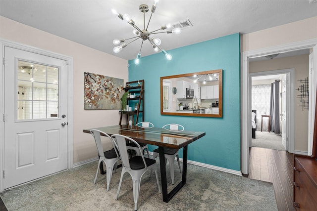 4204 Geddes Ave, Fort Worth, TX 76107 - dining area with a chandelier and baseboards