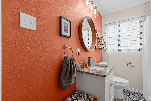 4204 Geddes Ave, Fort Worth, TX 76107 - bathroom featuring vanity and a textured wall